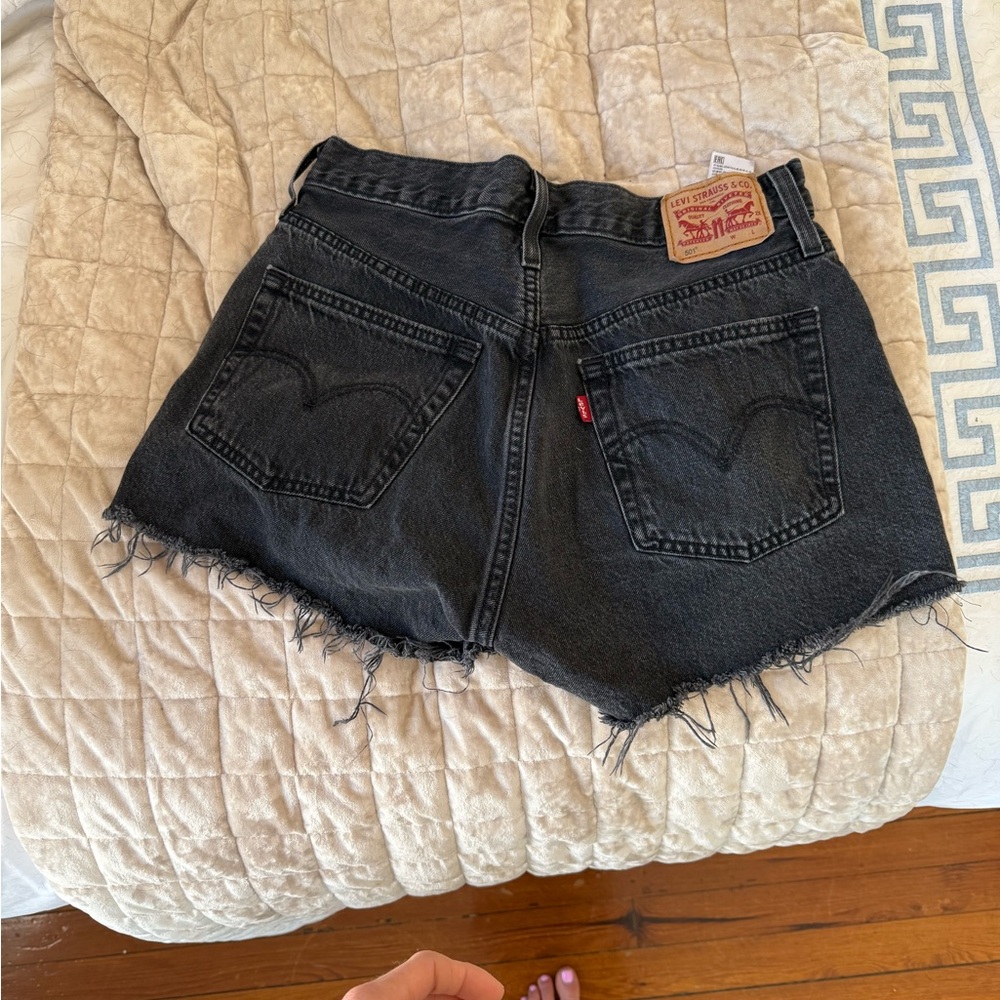 Levi’s Black Washed jean shorts size 28